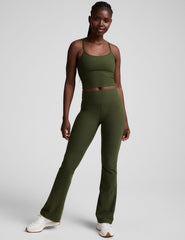 green mid-rise bootcut pants.