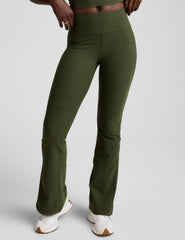 green mid-rise bootcut pants.
