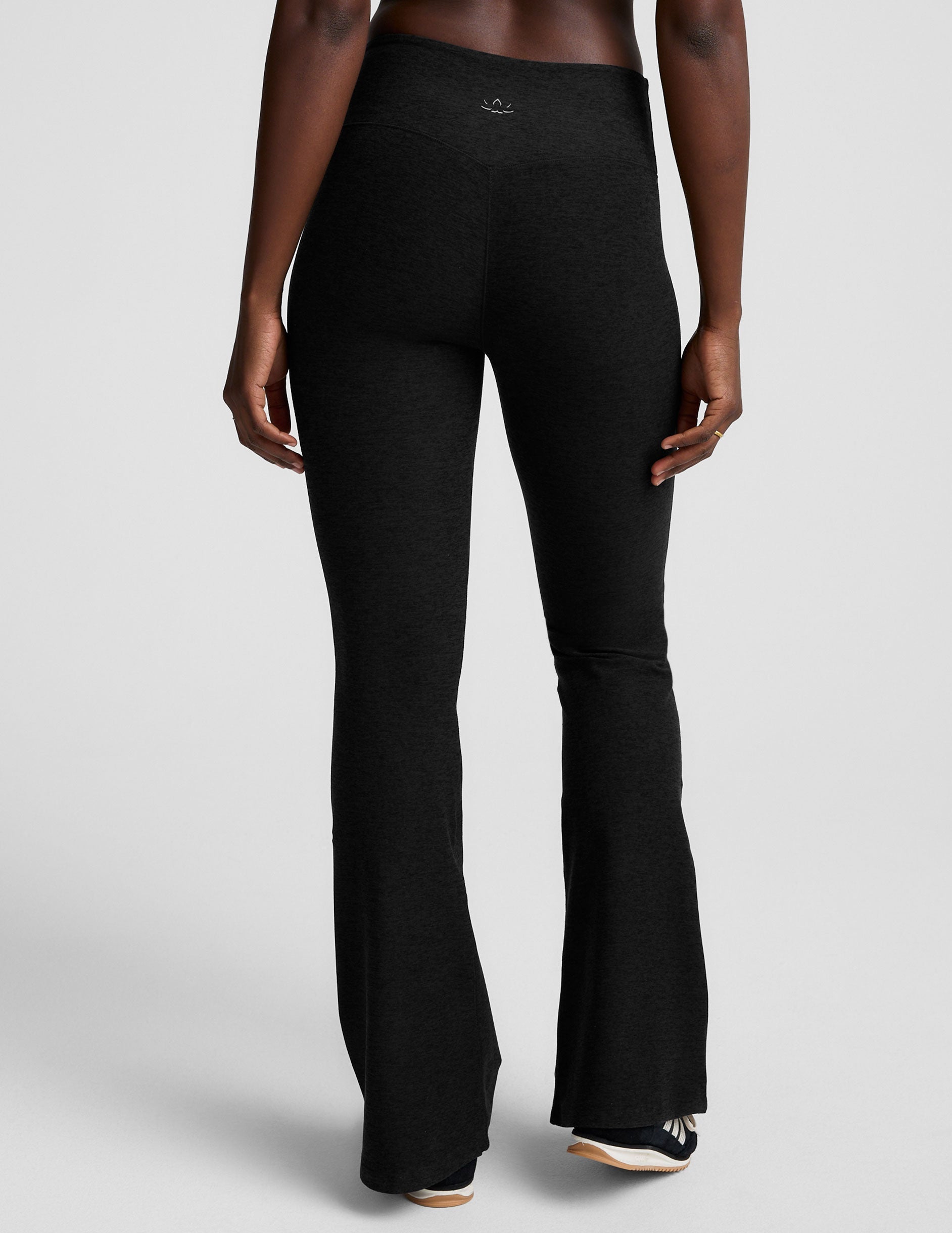 black mid-rise bootcut pant.