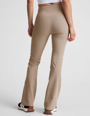 brown high-waisted bootcut pants with side pockets.