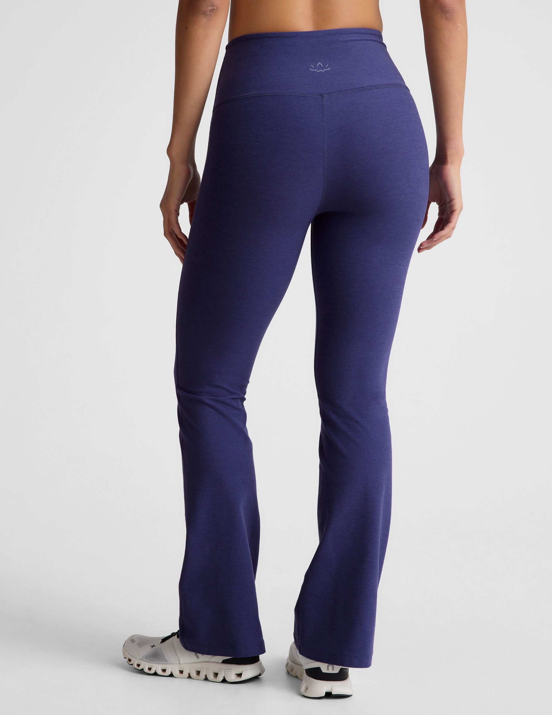 blue high-waisted bootcut pant with pockets.