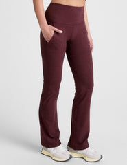red high-waisted bootcut pants with pockets.