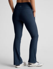 blue flare pant with slit pockets at sides