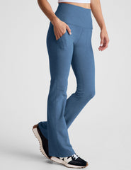 blue high-waisted bootcut pants with pockets.