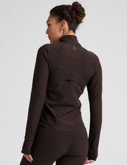 brown zip-up mock neck jacket with pockets and thumbholes.