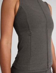 grey zip-up vest with mesh detail on upper back and pockets.