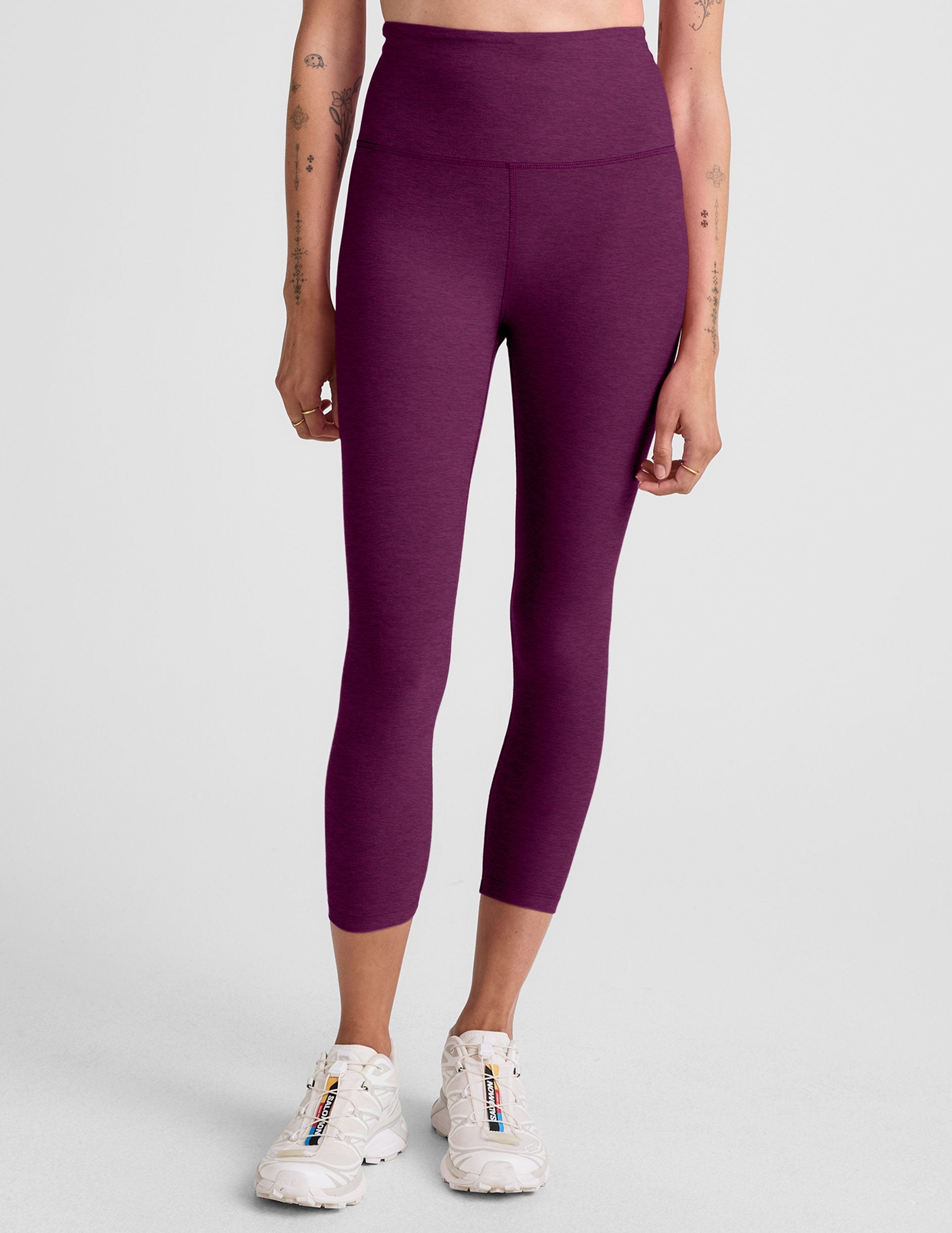 purple high-waisted capri length leggings.