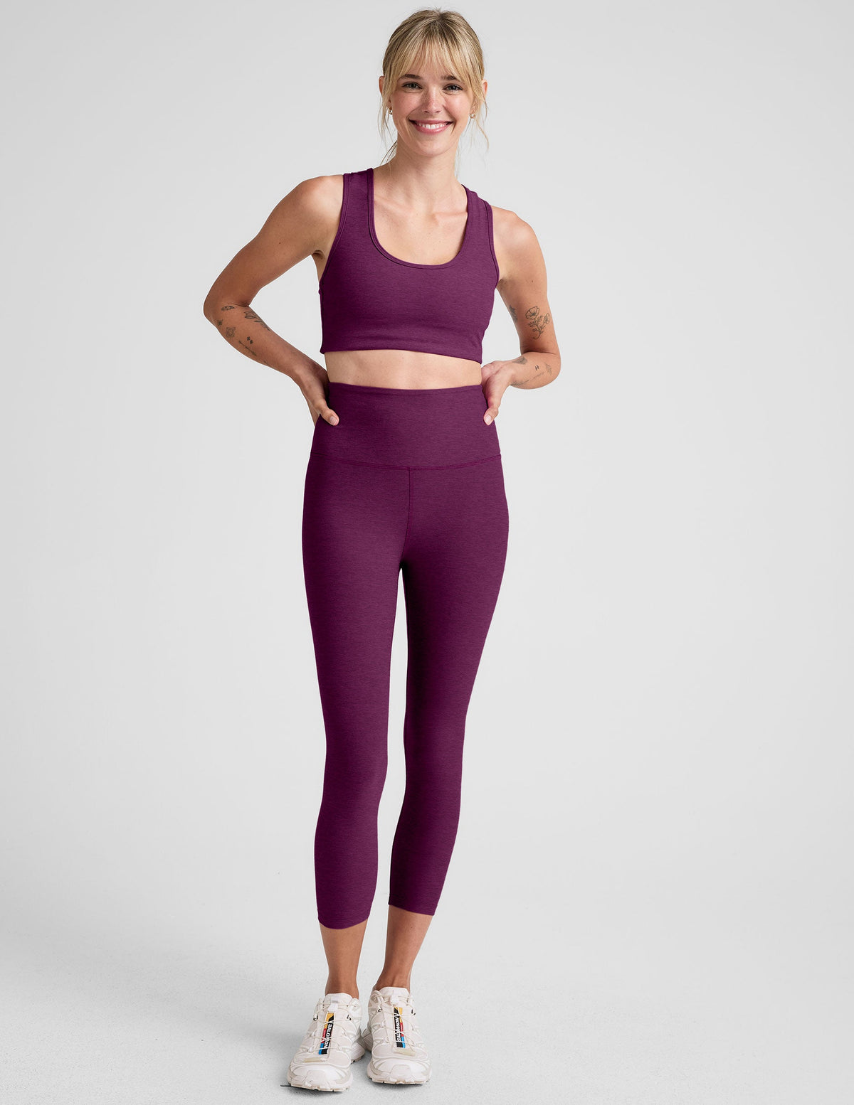 purple high-waisted capri length leggings.