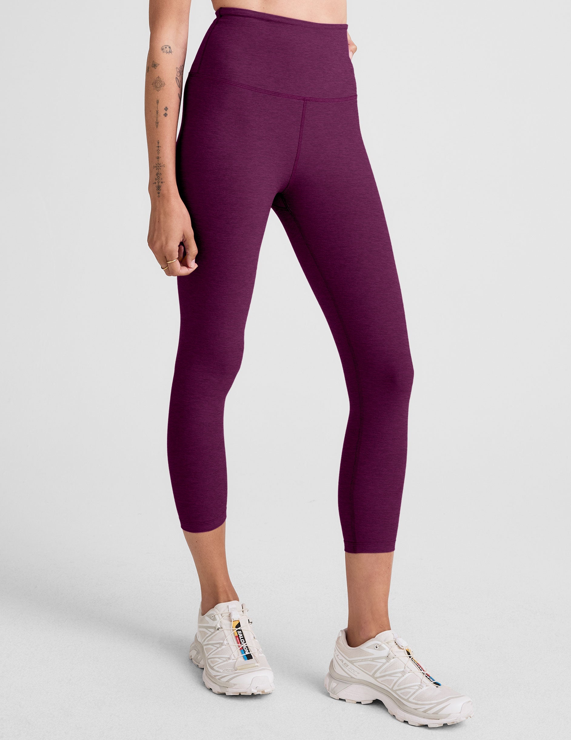 purple high-waisted capri length leggings.