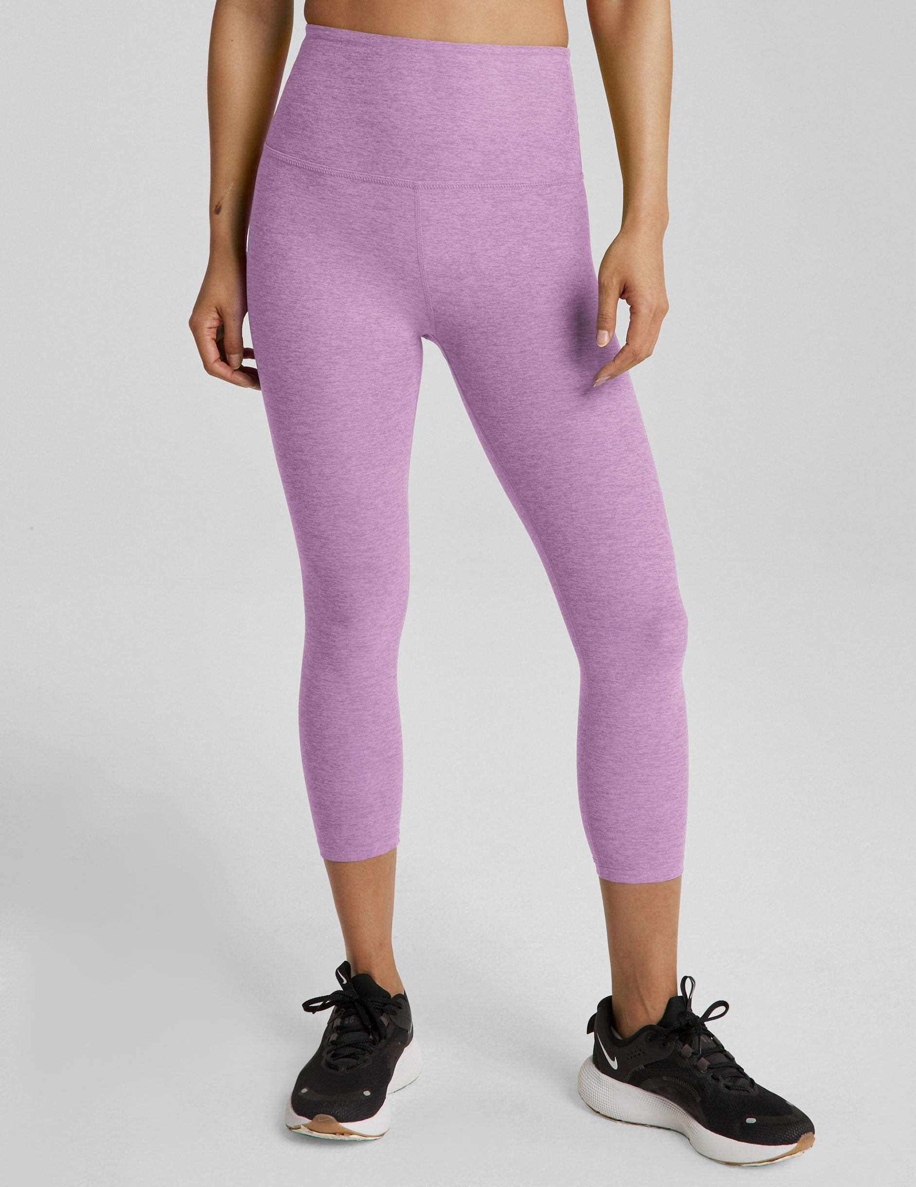 purple high-waisted capri length legging.