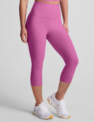 pink high-waisted capri length leggings.
