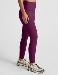 purple high-waisted midi length leggings.