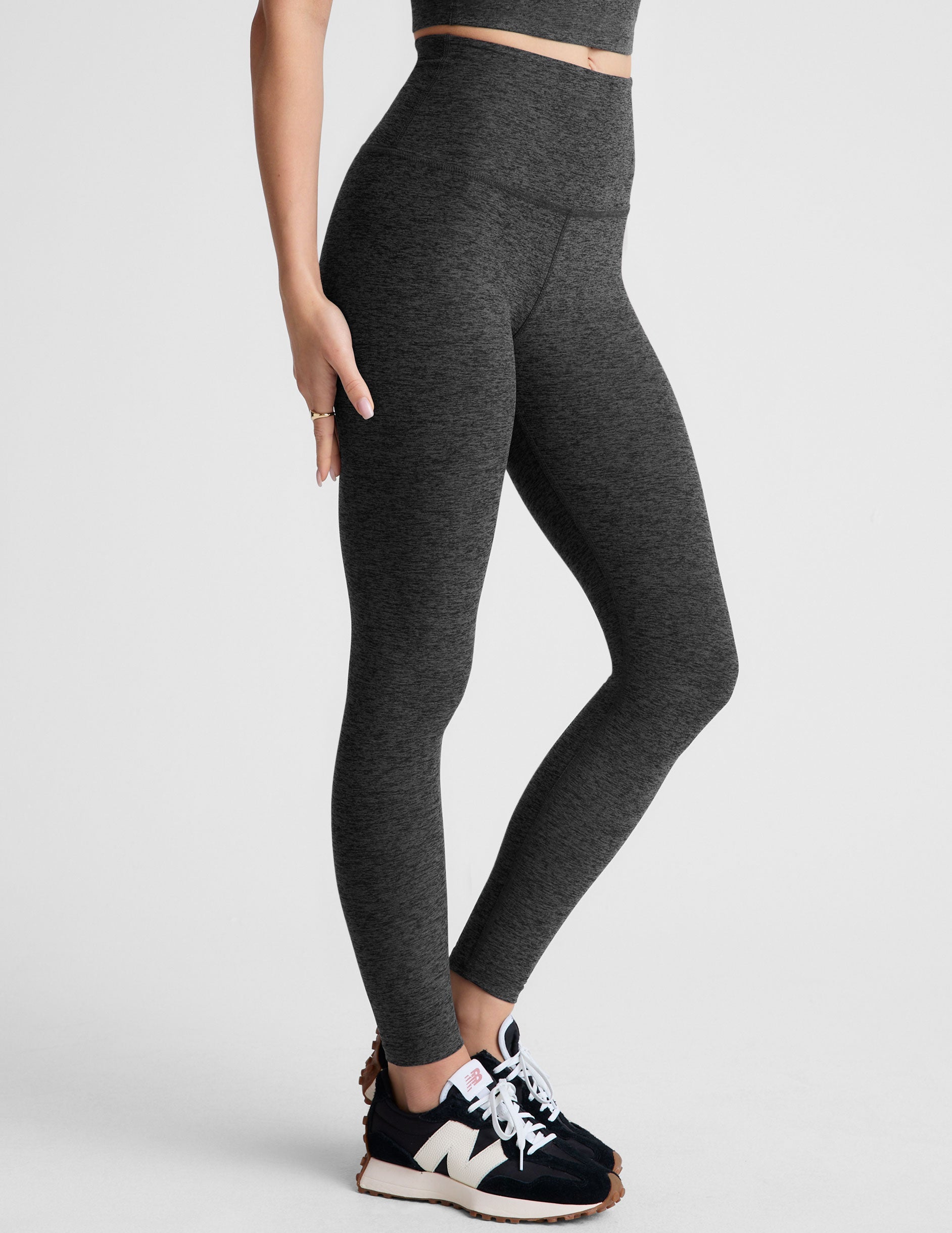 black-charcoal high-waisted midi leggings.