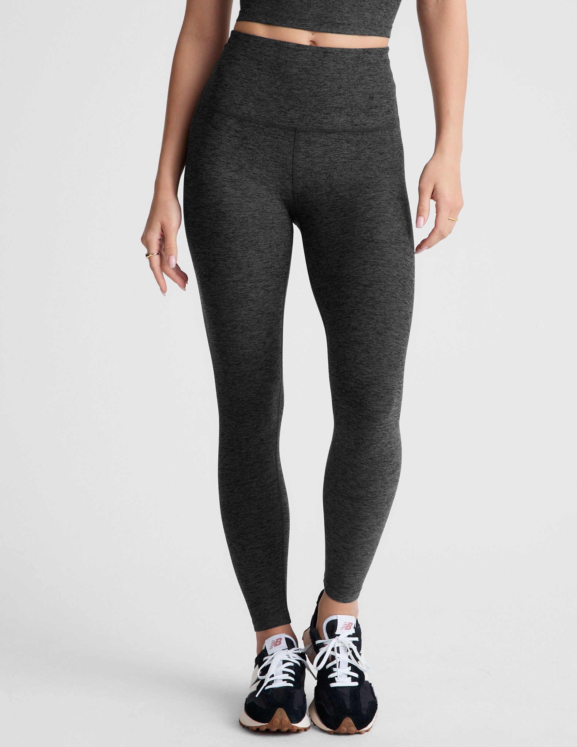 black-charcoal high-waisted midi leggings.