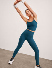 blue high-waisted midi length leggings.