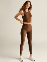 brown high-waisted midi length leggings.