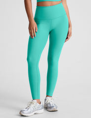 blue high-waisted midi length leggings.