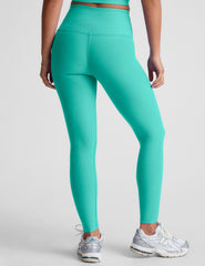 blue high-waisted midi length leggings.