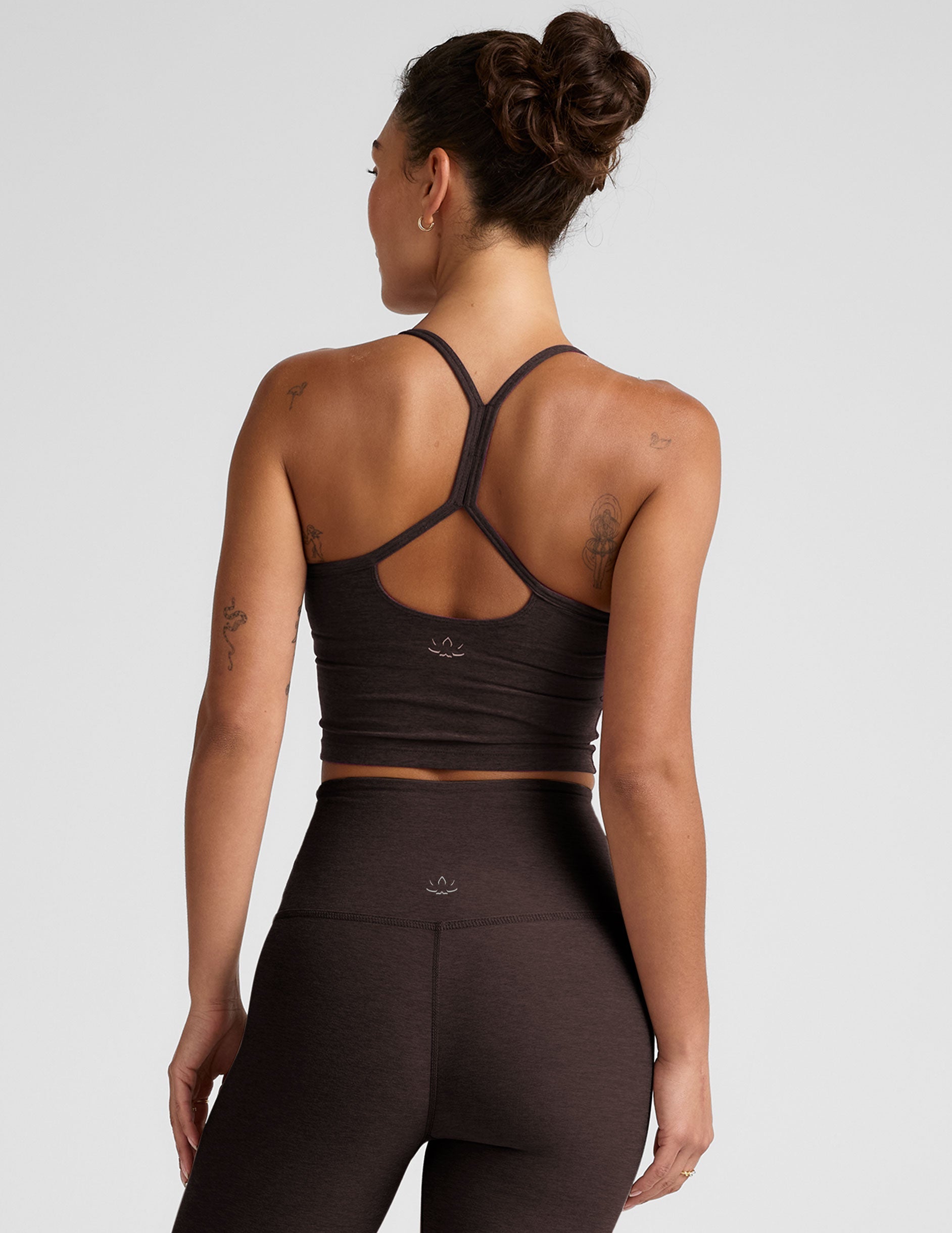 brown racerback cropped tank with slim straps.