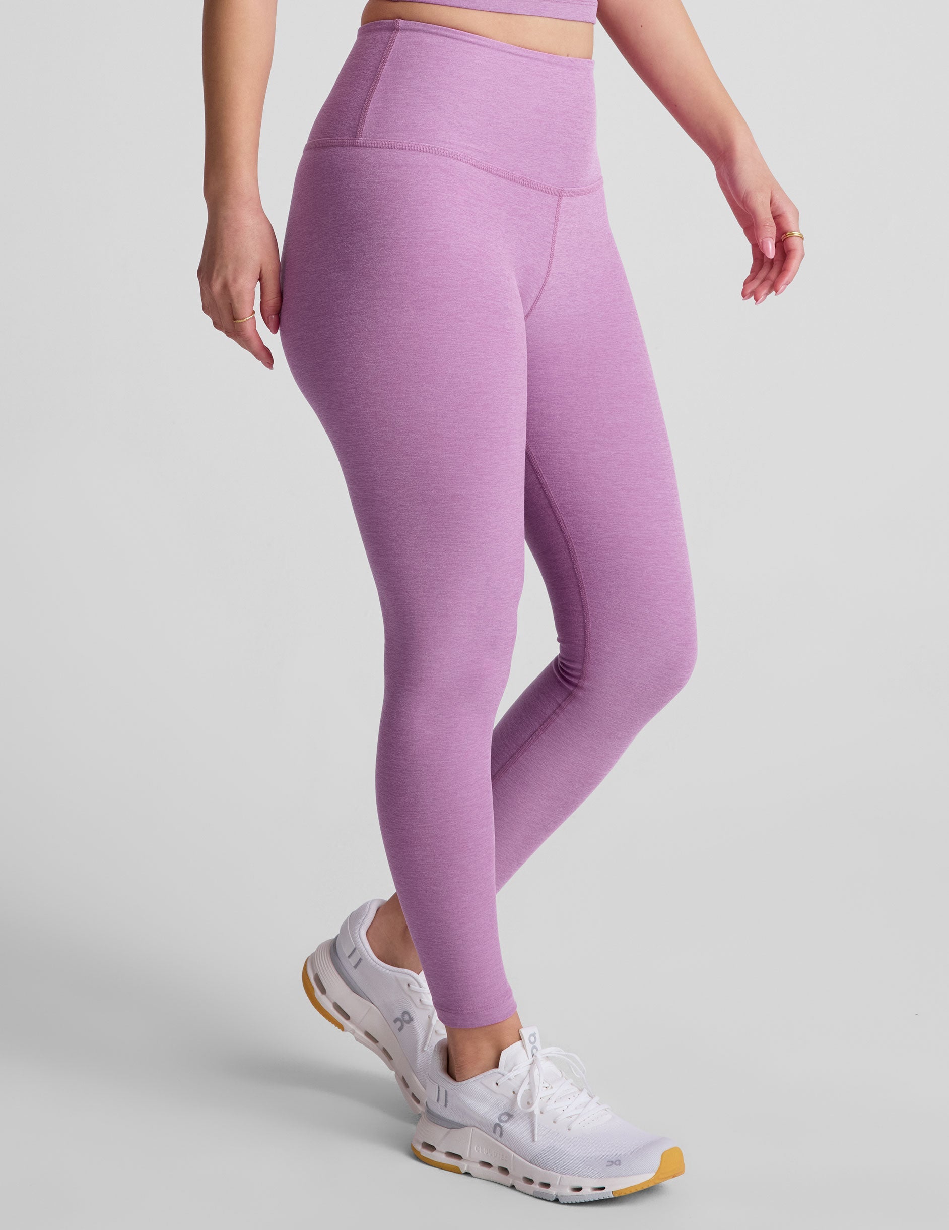 purple high-waisted midi length legging.