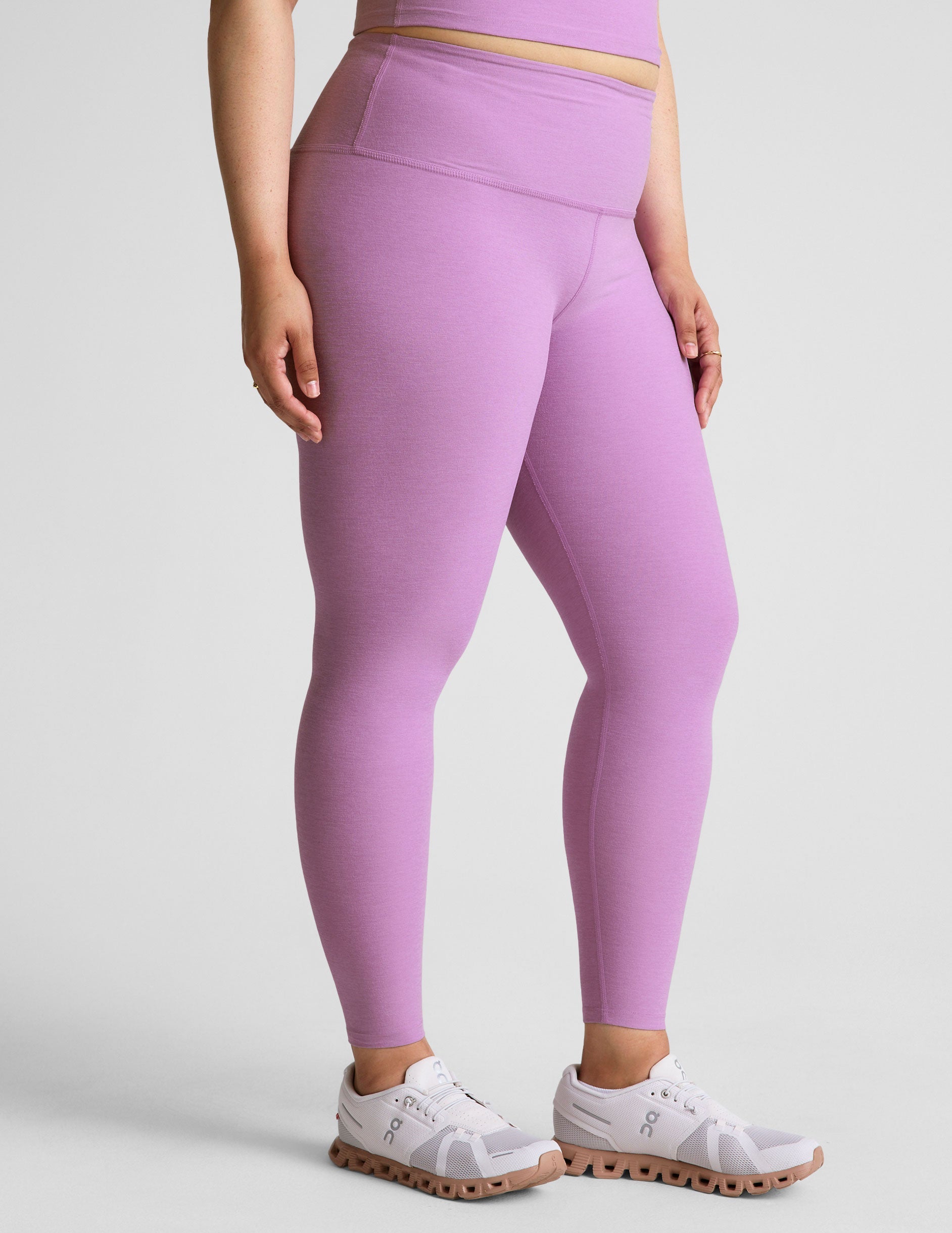 purple high-waisted midi length legging.