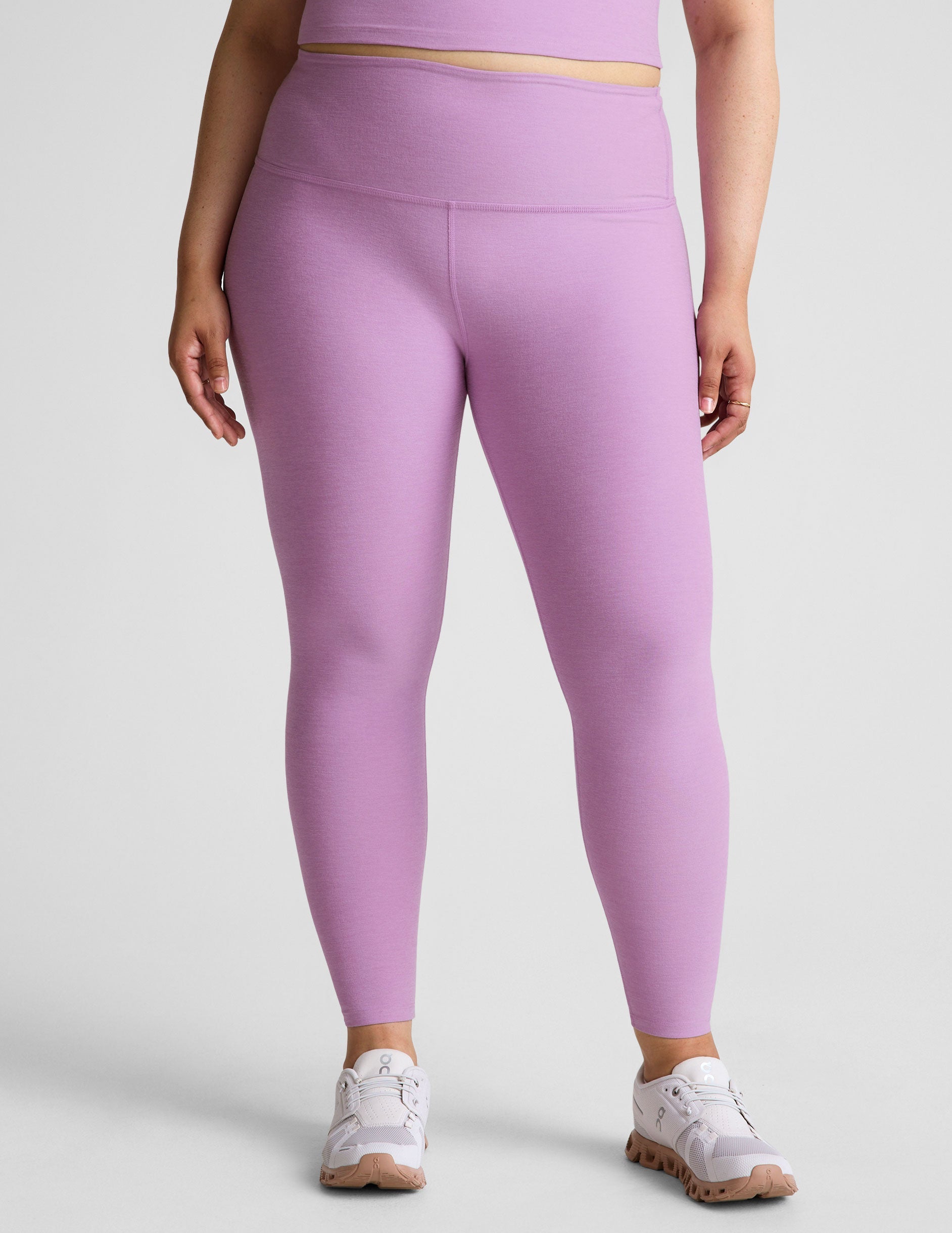 purple high-waisted midi length legging.