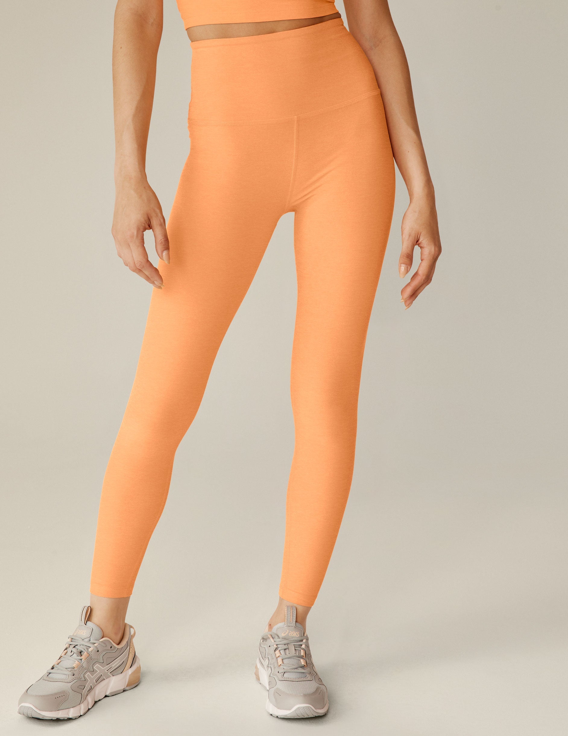 orange high-waisted midi spacedye leggings.