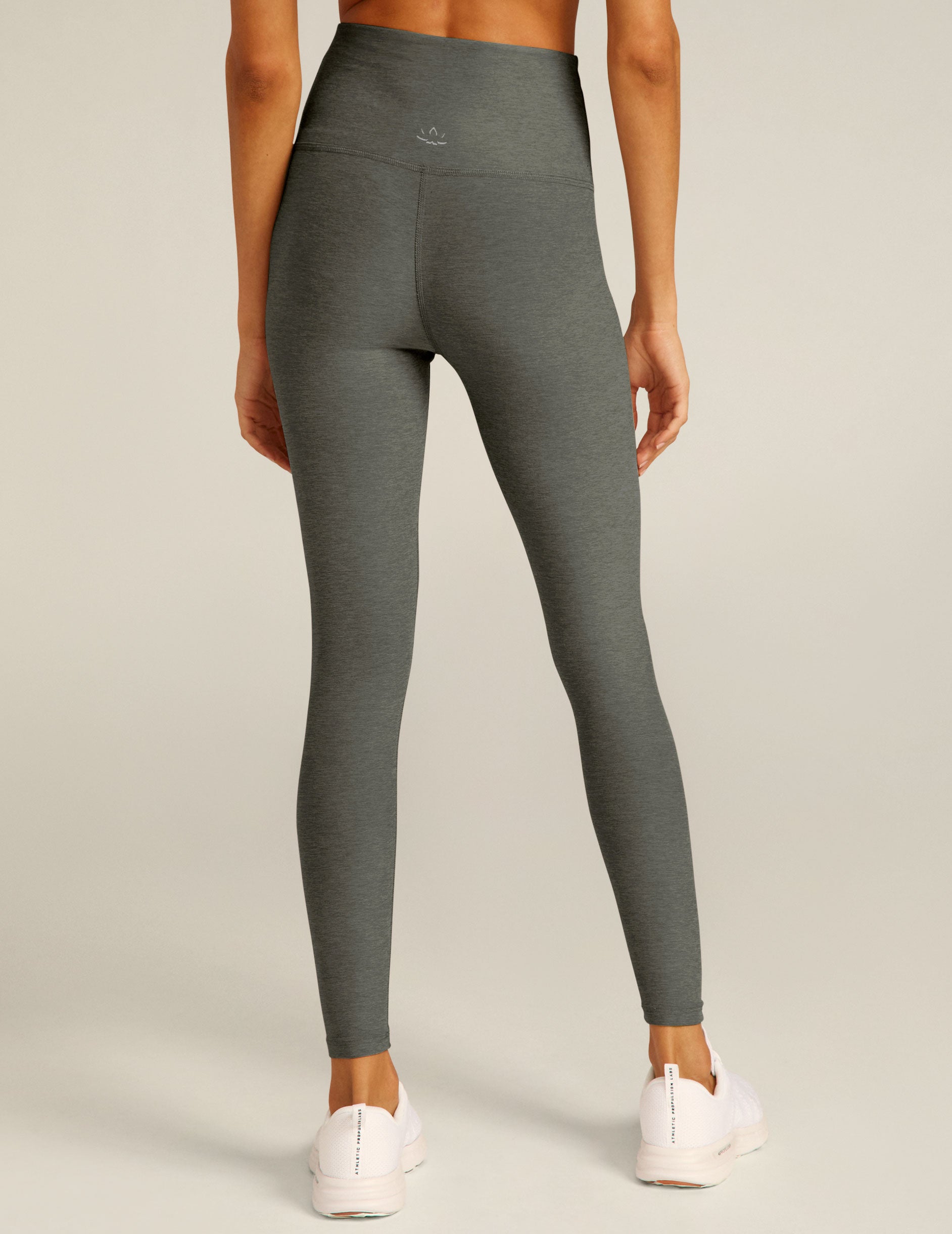 gray high-waisted midi leggings.