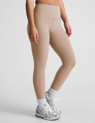 brown high-waisted midi length leggings.
