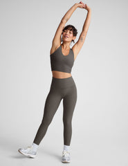 gray high-waisted midi length leggings.