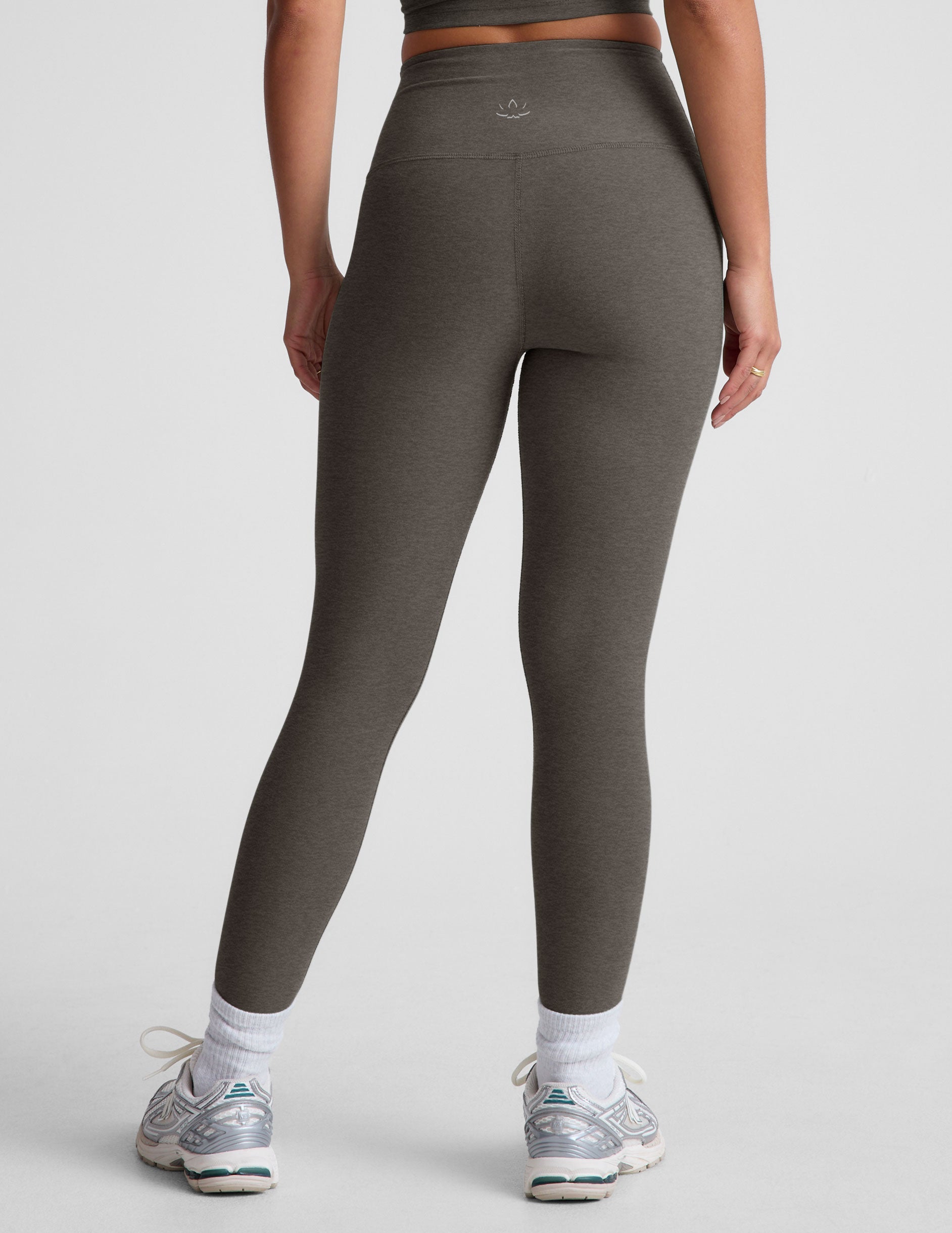 gray high-waisted midi length leggings.