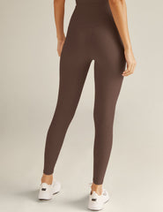 brown high-waisted midi leggings.