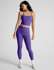 purple high-waisted midi length leggings.