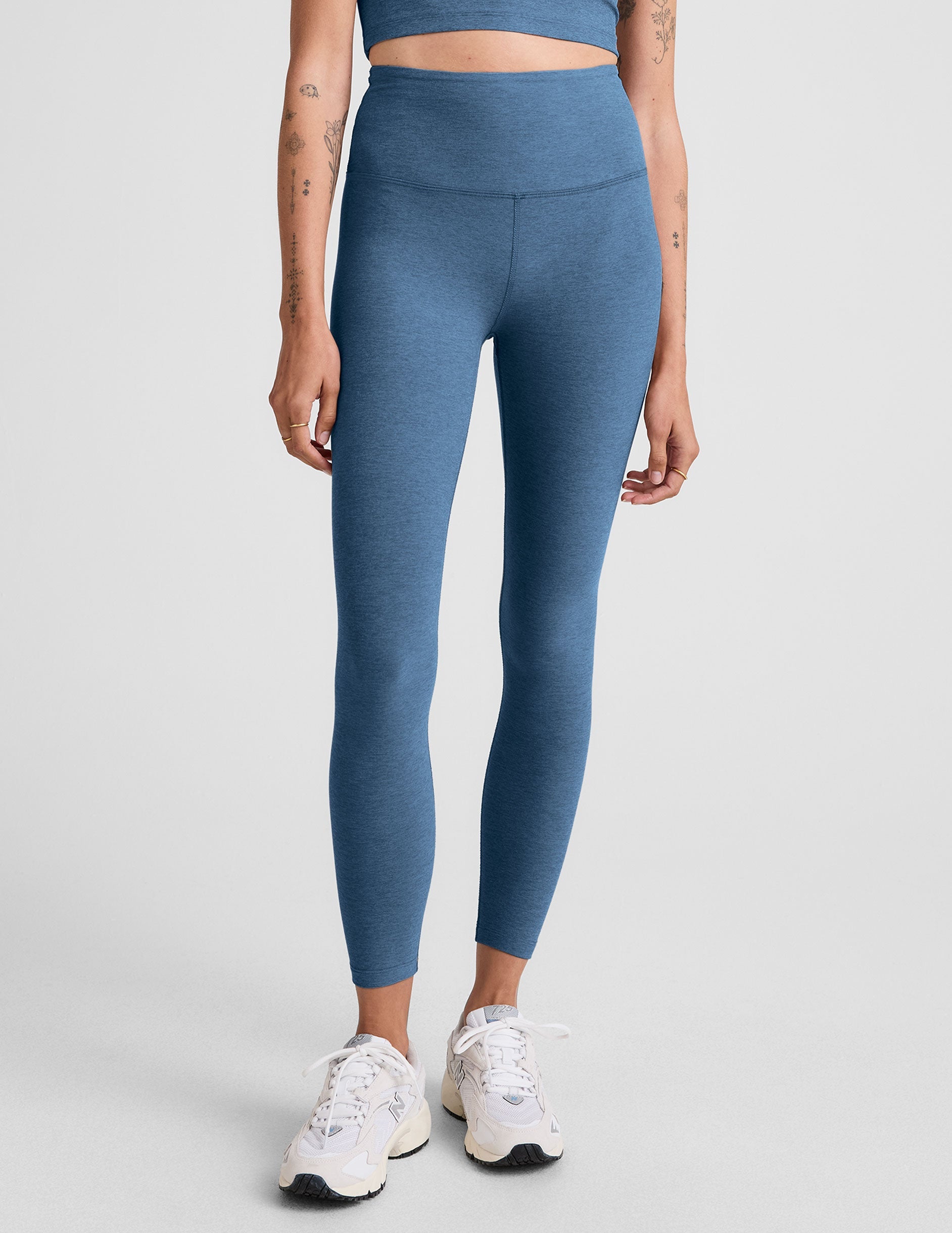 blue high-waisted midi length legging.