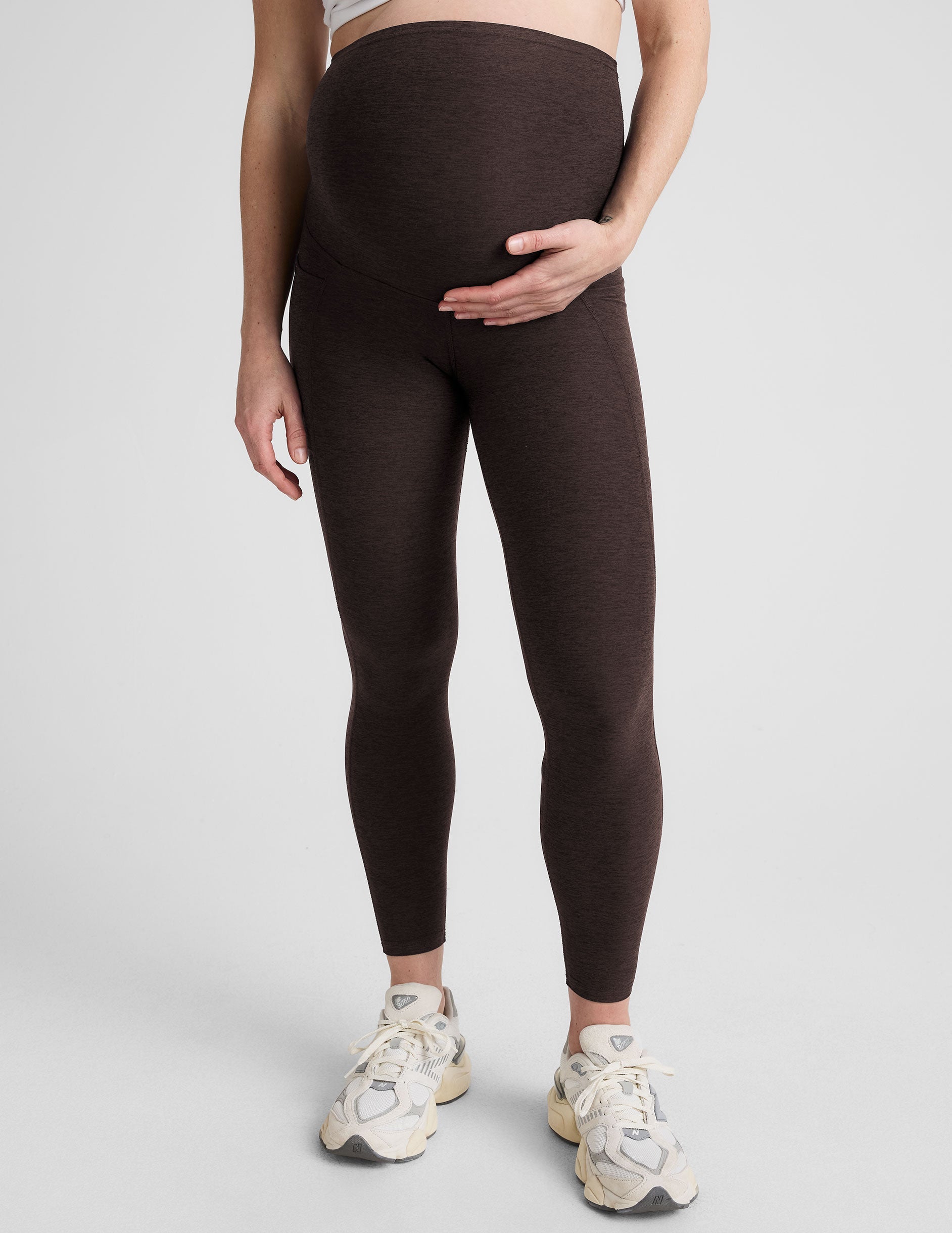 brown maternity midi length leggings with pockets.