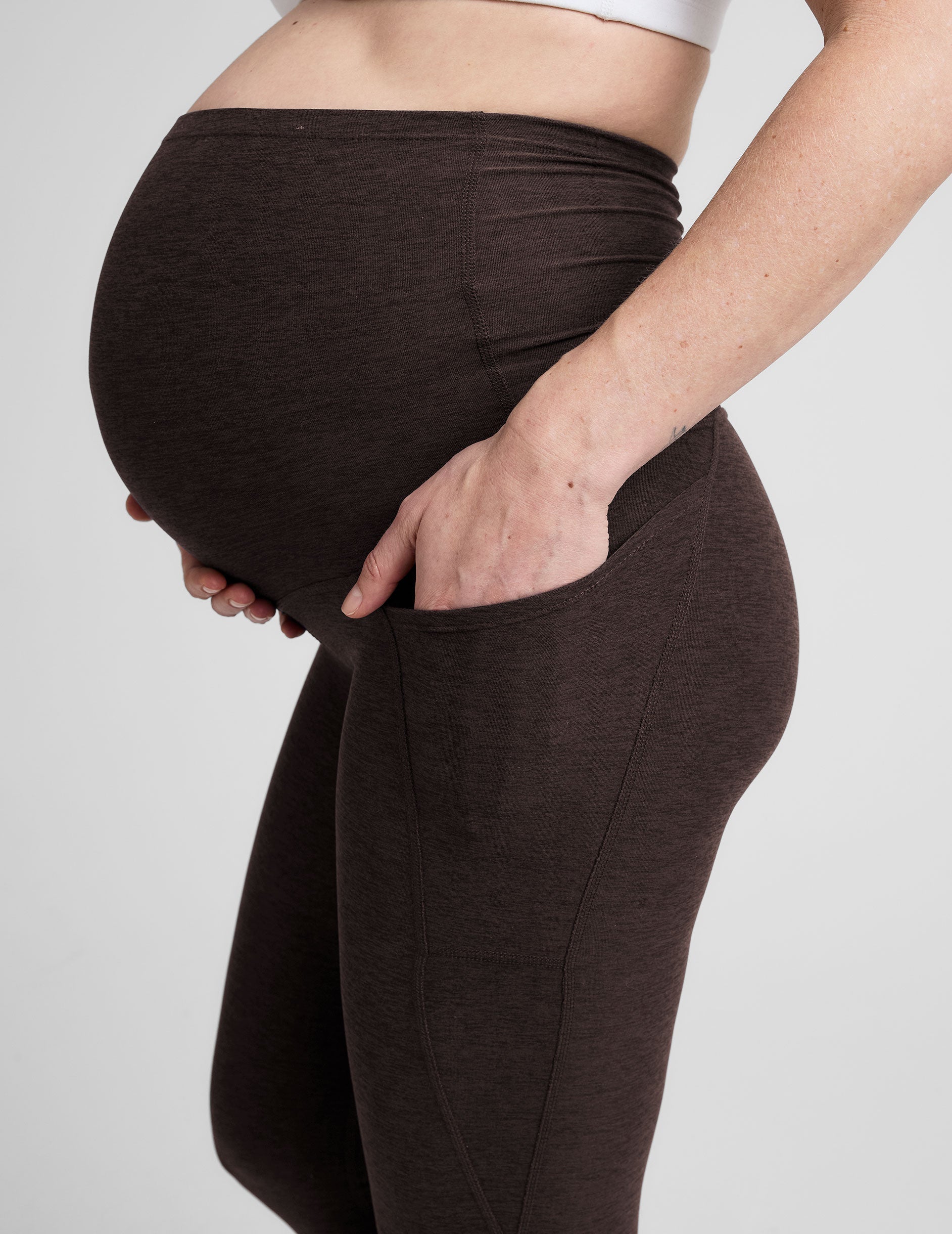 brown maternity midi length leggings with pockets.