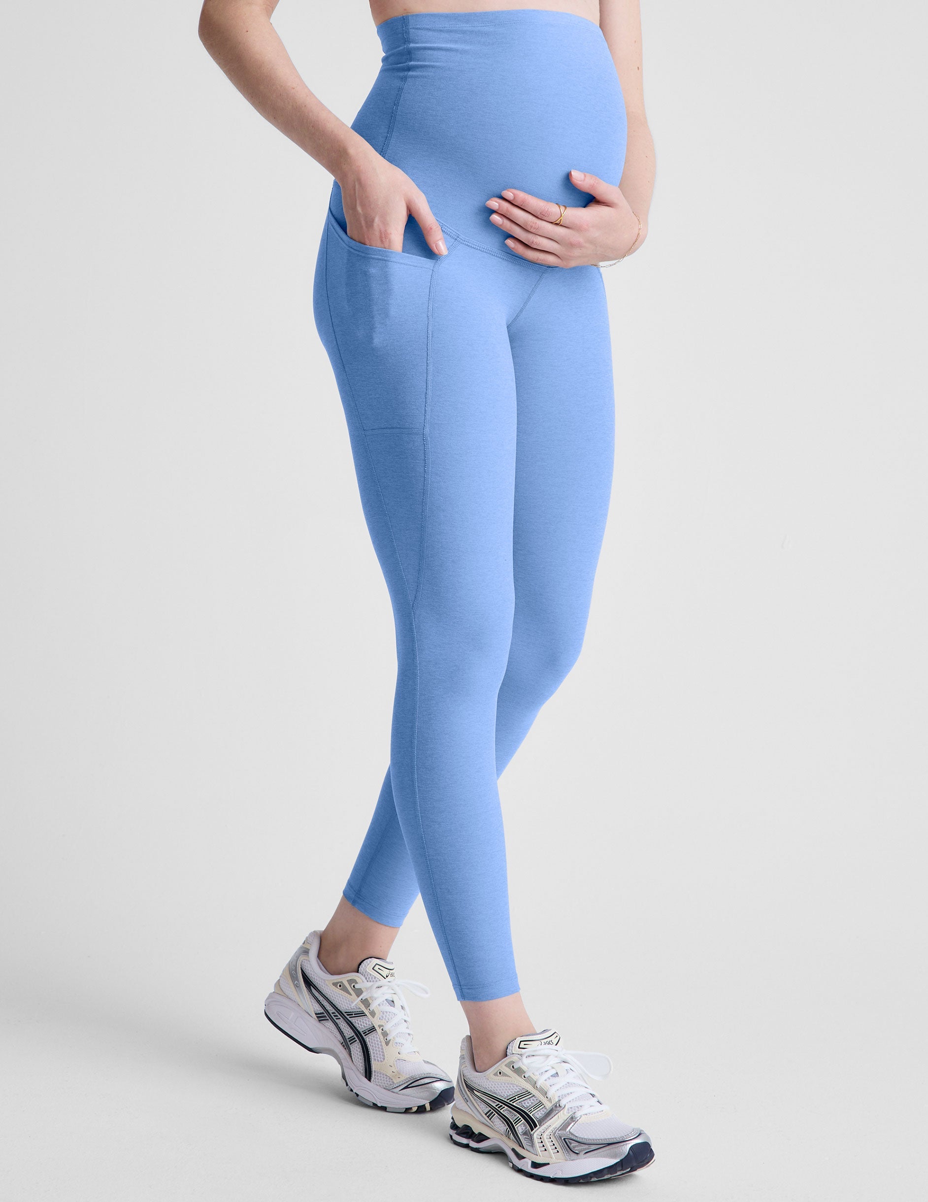 blue maternity midi length leggings with pockets.