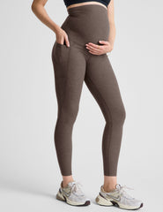brown maternity midi leggings with side pockets.