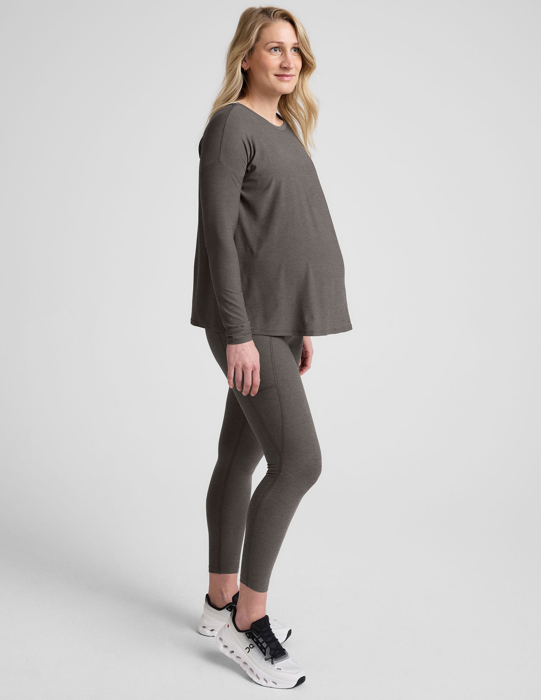 grey midi length maternity leggings with side pockets.