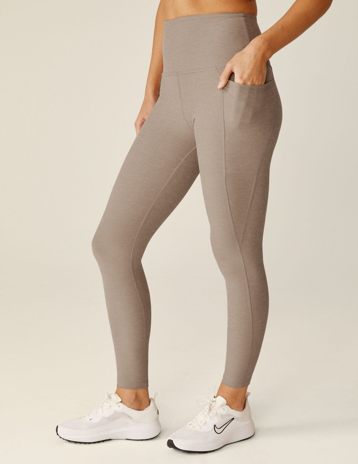 brown high-waisted midi pocket leggings.
