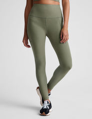 green high-waisted midi length legging with side pockets.