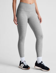 gray high-waisted midi length leggings with a crossover detail on the front waistband.