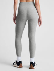 gray high-waisted midi length leggings with a crossover detail on the front waistband.