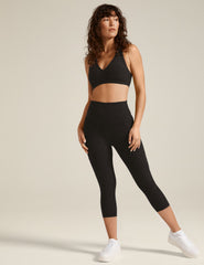 black capri midi legging with pockets at sides.