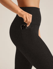black capri midi legging with pockets at sides.