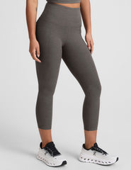 gray high-waisted capri length leggings with pockets.