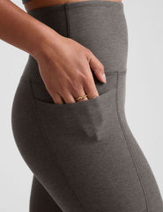 gray high-waisted capri length leggings with pockets.