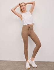brown high-waisted midi leggings with a drawstring at waistband.