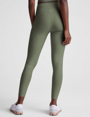 green high-waisted midi length leggings with pockets and a drawstring at waistband.