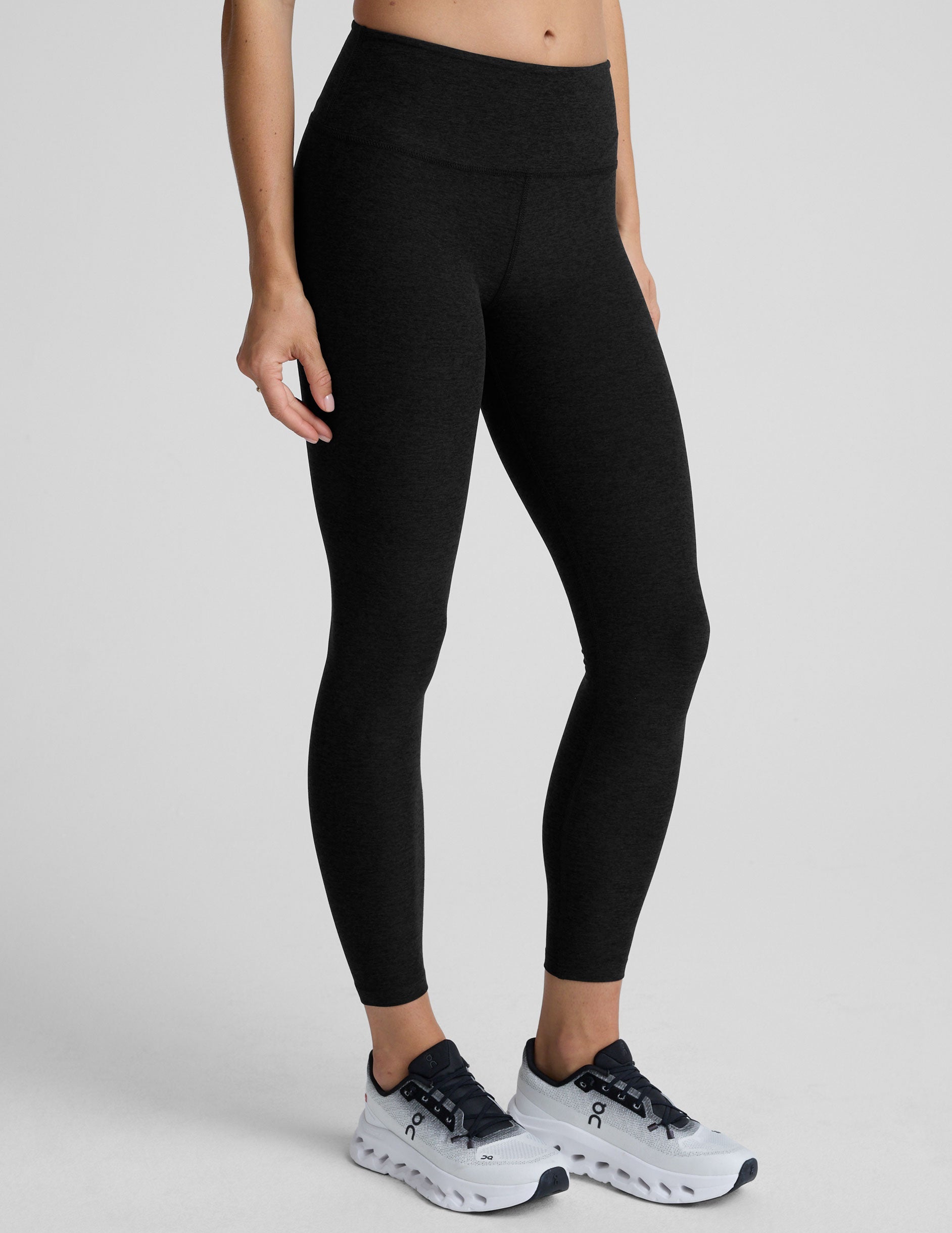 black mid-rise midi length leggings.